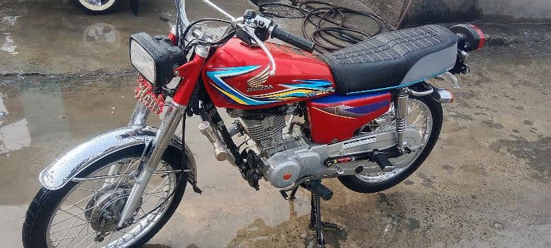 Honda 125 golden number Akk 202 with golden serial number 786 4