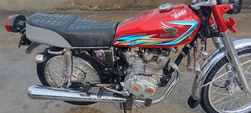 Honda 125 golden number Akk 202 with golden serial number 786 5