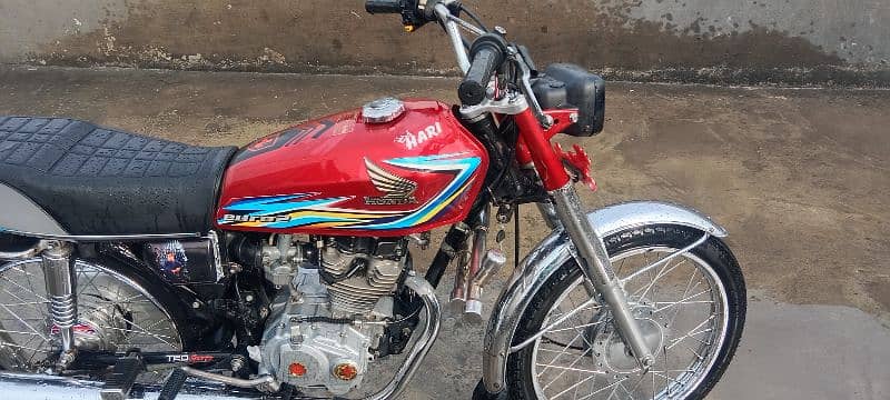 Honda 125 golden number Akk 202 with golden serial number 786 6