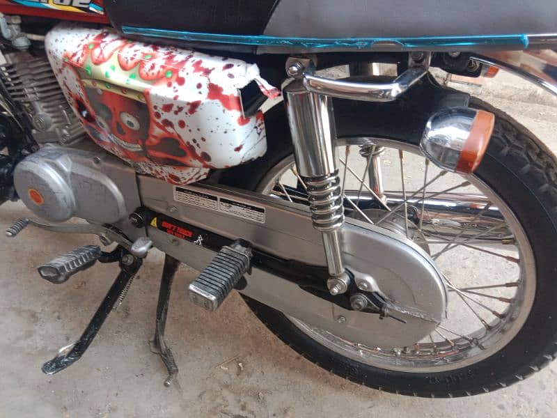 Honda 125 golden number Akk 202 with golden serial number 786 12