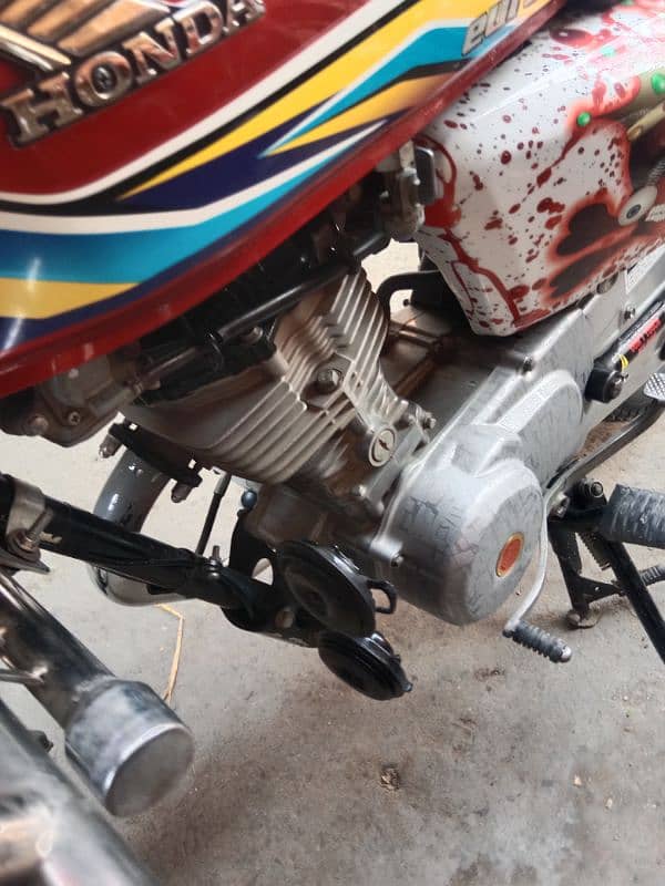 Honda 125 golden number Akk 202 with golden serial number 786 13