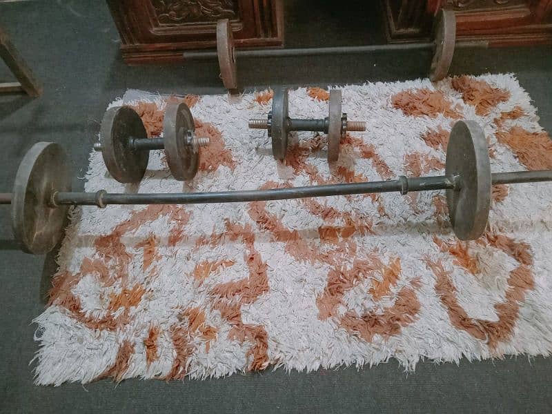 body building iron sticks and weight for sale 2