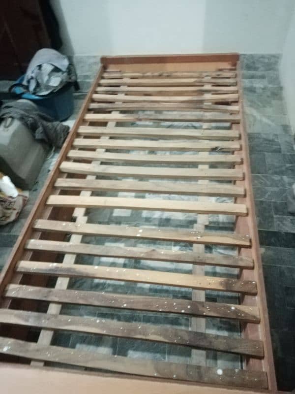 single wooden bed with storage space 4