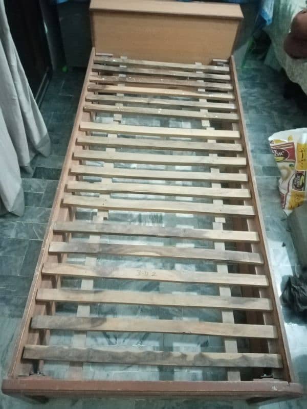 single wooden bed with storage space 6