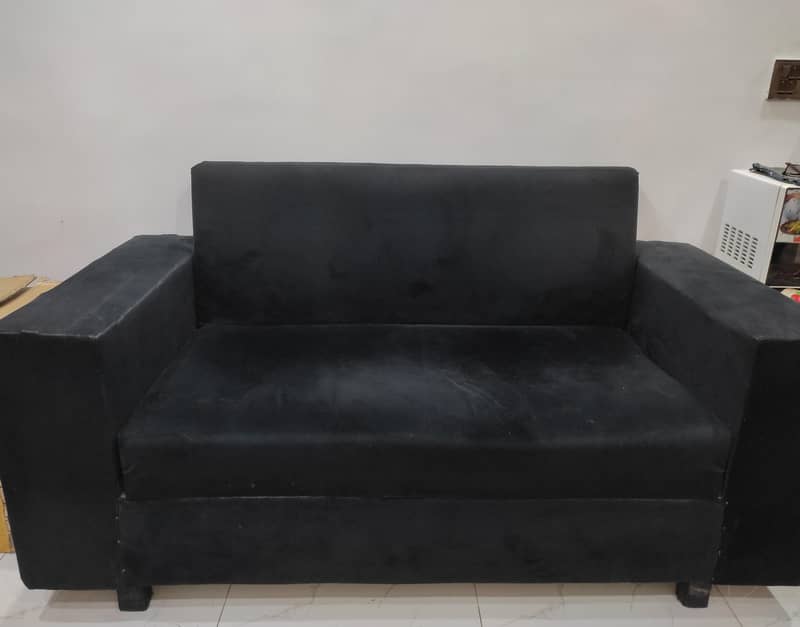 4 seater sofa 2+2 black colour normal condition 1