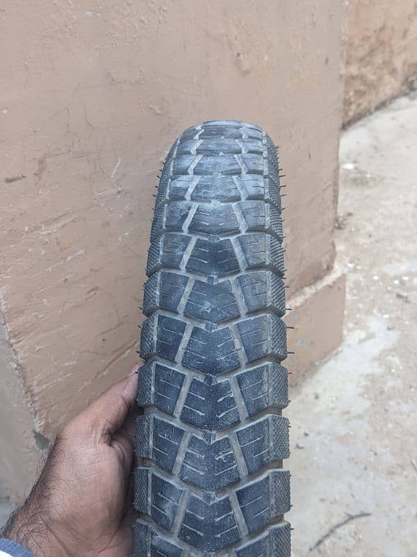 i want to sell my gs150 tyre with tube in good condition 2