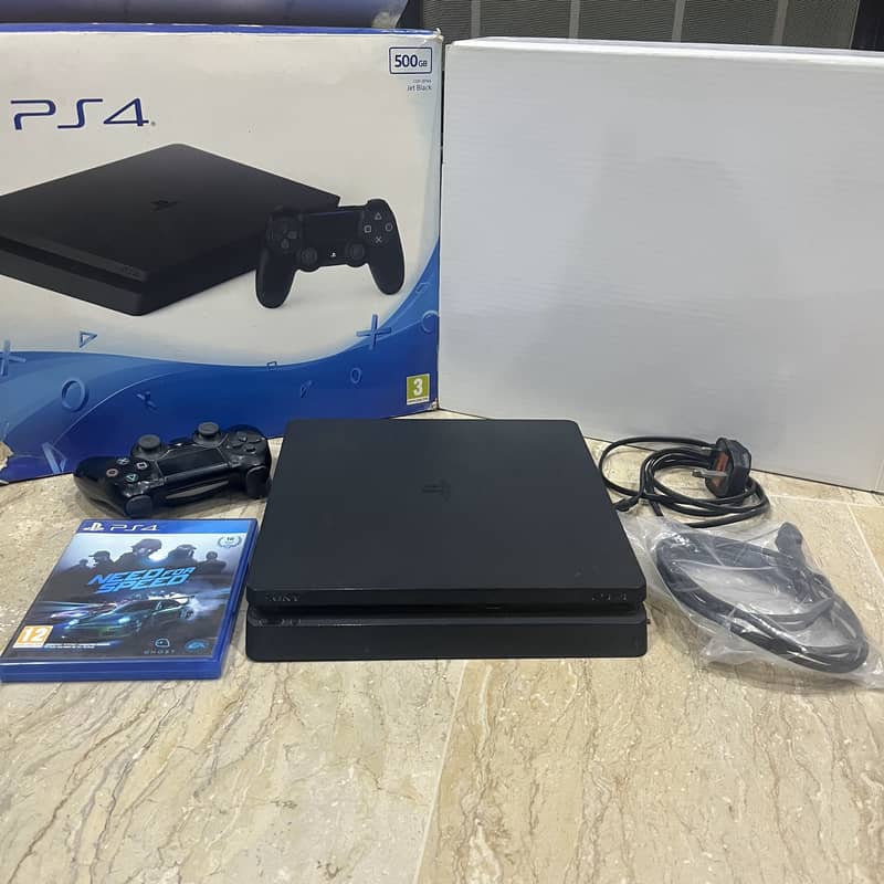 PlayStation 4 Slim 500GB Sleek Design with Powerful Gaming Performance 0