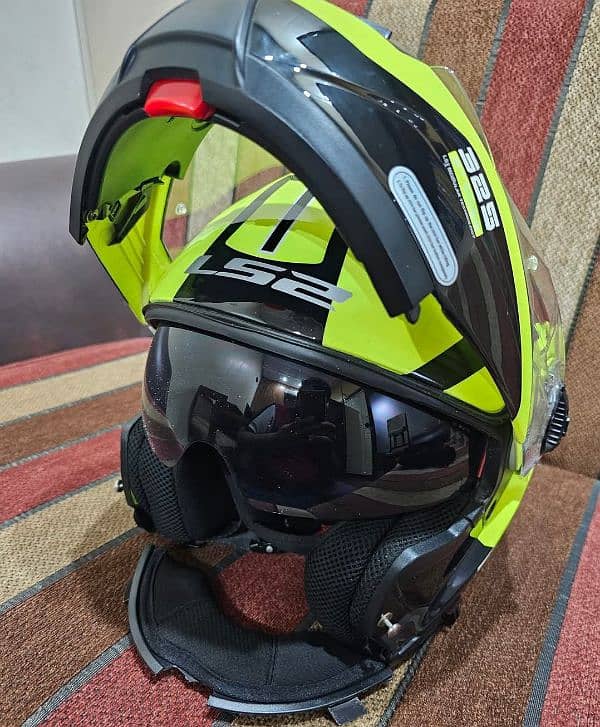 green Ls2 flipup helmet. 0