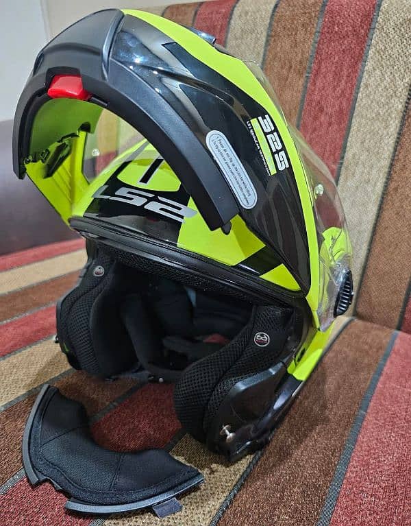 green Ls2 flipup helmet. 1