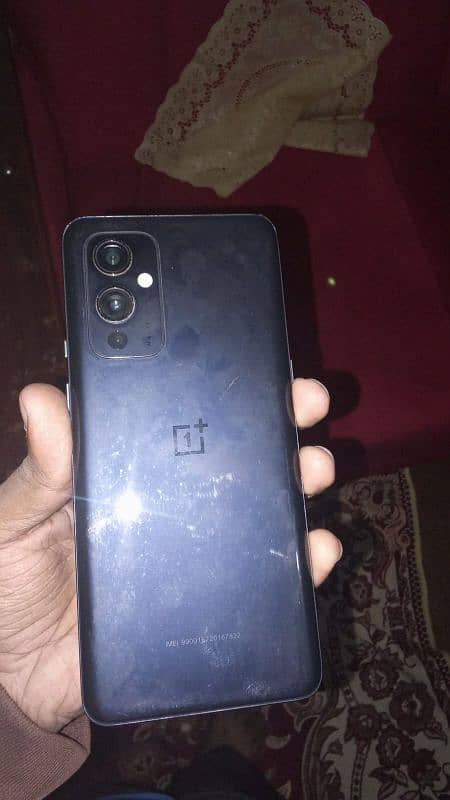 OnePlus 9 -   8/128.10 by 9 Condition 10