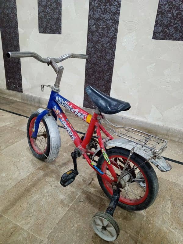 child cycle with spiderman sticker. 3