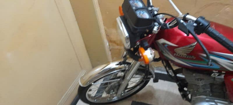 Honda 125 model 10-11-2022 7700  km Driven   Islamabad registered 11