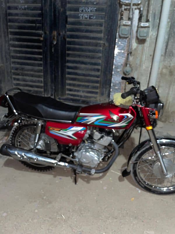 HONDA CG-125 2023 Red Color Karachi Number. 6