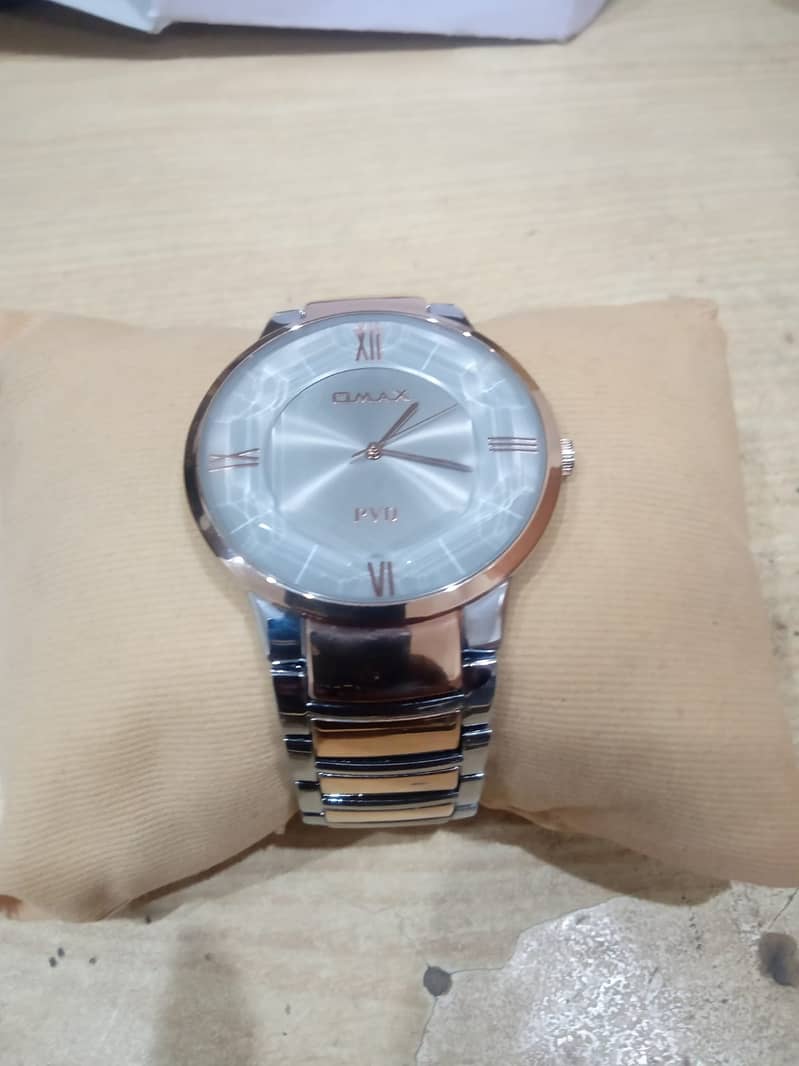 OMAX Brand new watch 10/10 Condition with Golden stainless 2