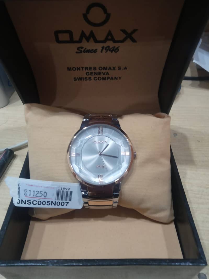 OMAX Brand new watch 10/10 Condition with Golden stainless 0