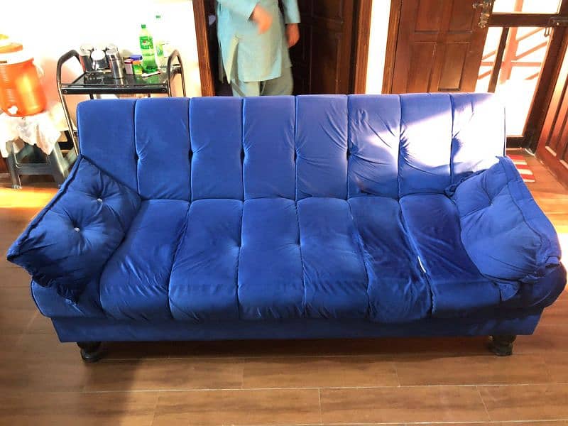 Blue sofa cum bed 0