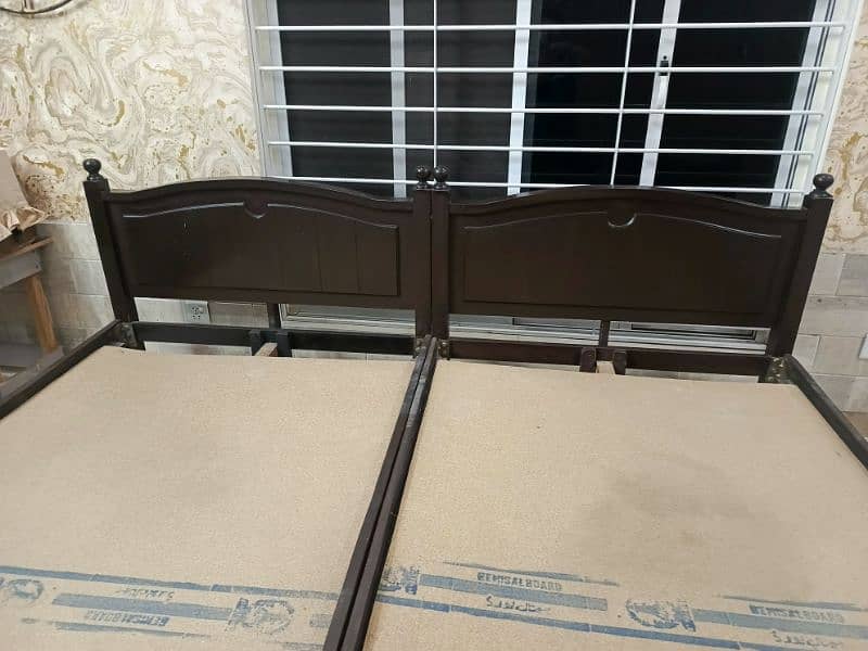 Two single bed in good condition 2