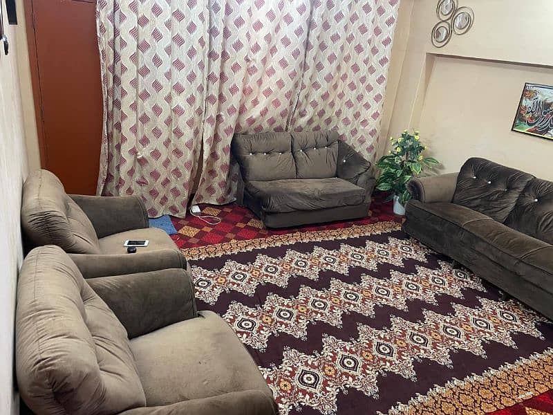 7 seaters sofa set in brown color used only 6months 1