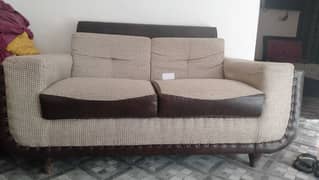 Slightly used 7 seater sofa set with center table