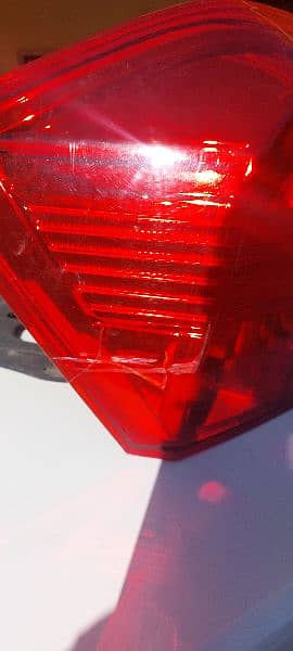 Original Honda City rear left light - slightly cracked. 3