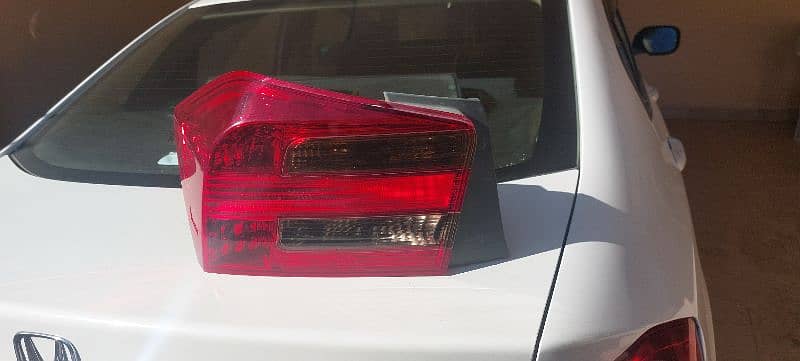 Original Honda City rear left light - slightly cracked. 4