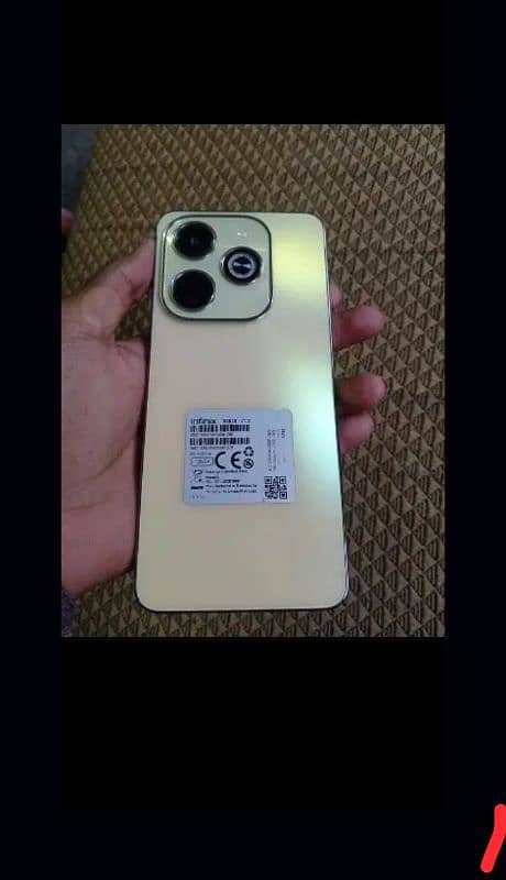 Infinix Hot 40i 8+8 128 3 month warranty Golden Coloure 0