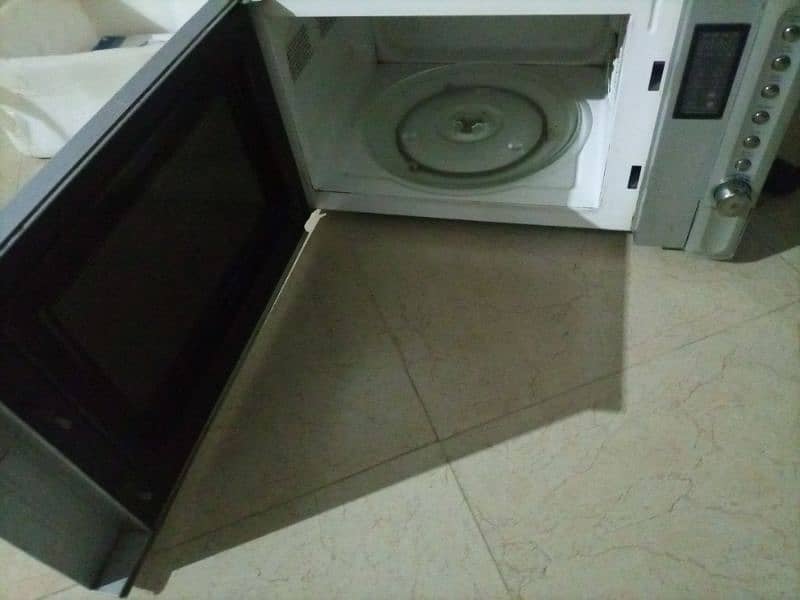 Waves microwave plus Grill BiG size urgent bechna ha 5