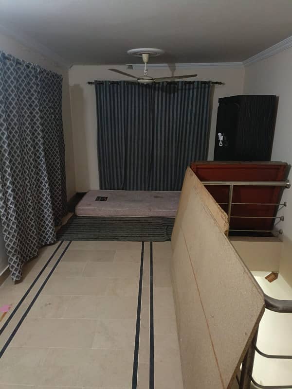 For rent G11/2 main service road Size 30*60 Uper portion 3 beds 3 baths Drawing dinner Tv lounge Kitchen Store Gas Pani bijli separate water bore Also available on hiring 03335043954 1