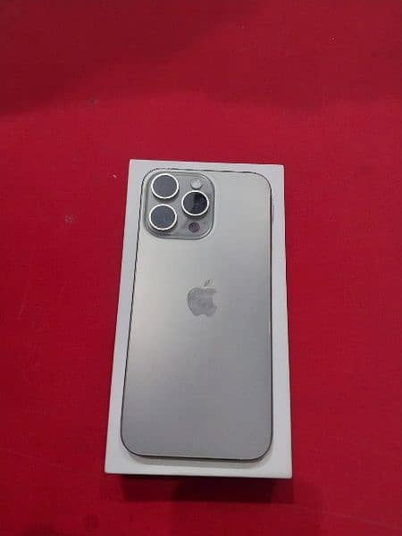 iphone 15promax natural taitnum 10/10 condiction 100 betry health 1