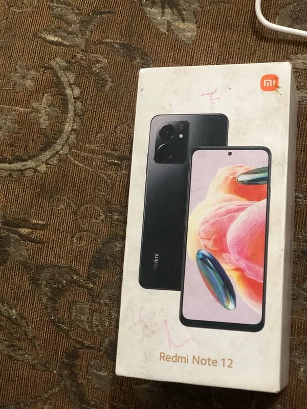 redmi note 12 with box all ok condition 10 by 9.5 1