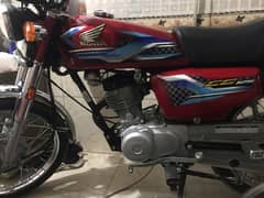 honda 125 red colr total genuine