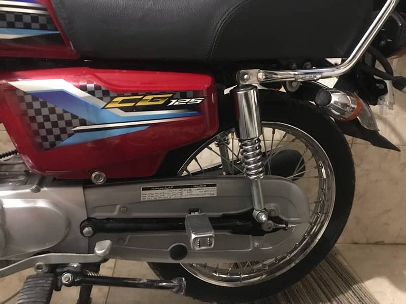 honda 125 red colr total genuine 1