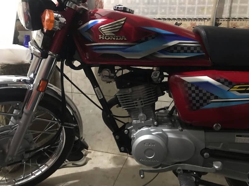 honda 125 red colr total genuine 2