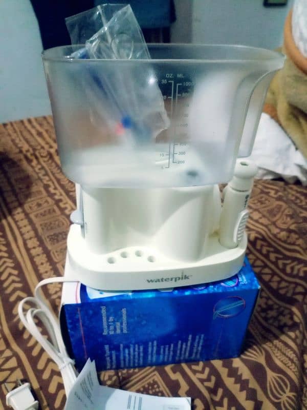 WATERPIK FLOSSER FOR HEALTHIER THEETH 4