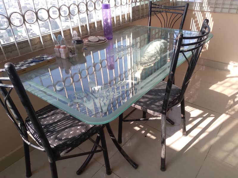 Urgent sale  6 seater Glass Dining Table with 3 chairs, good condition 2