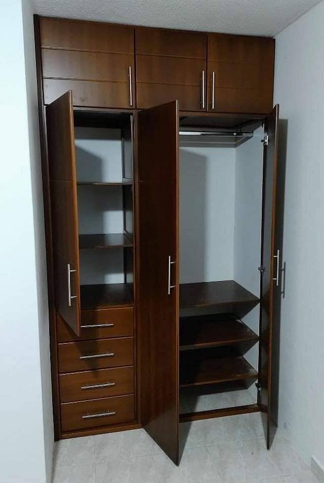 wooden doors,kitchen wooden works,wardrobes,media wall,wooden cabinet 10