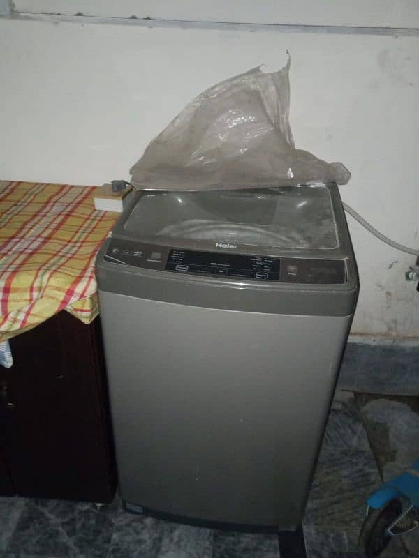 one hand used almost brand new wfully automatic washing machine 5