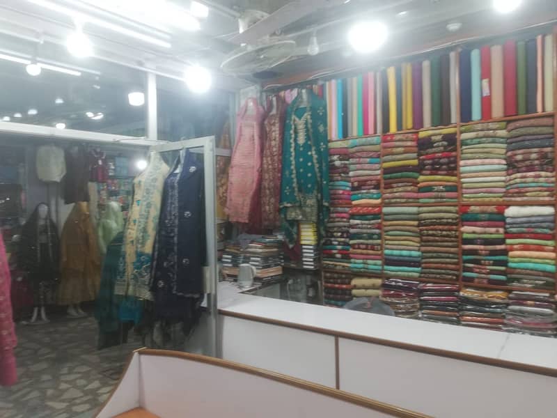 Running business cloth store for sale 0