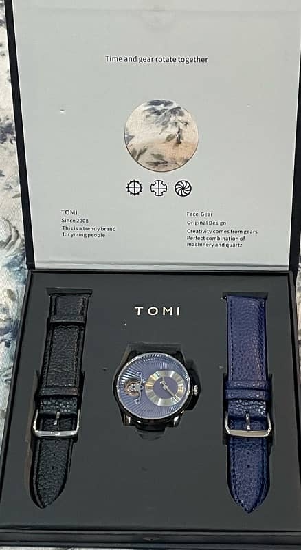 TOMI Watch 1