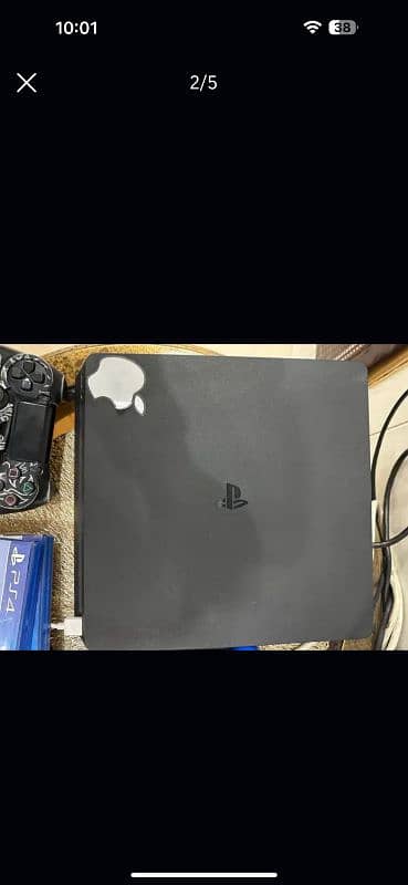 PS4 slim 1tb/ Scratchless / With 2 controllers and 2 cds . 4