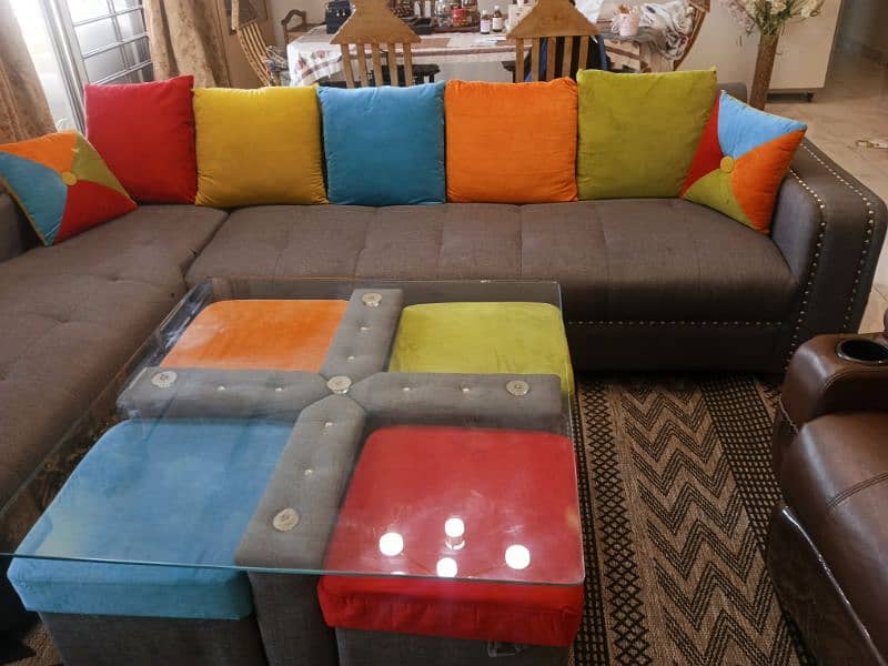 L- shaped sofa with customized table available for urgent sale 0