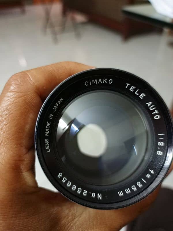 135mm f2.8 manual focus lens with canon adopter 1