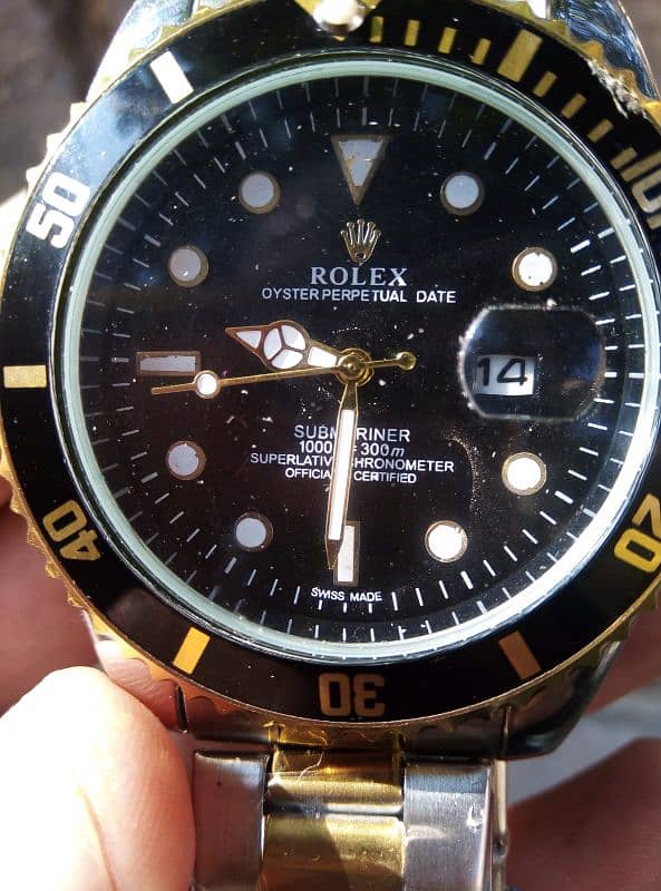 Rolex watch with golden steel strap 0