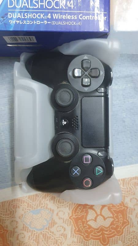 PS4 slim | Dualshock 4 controller | Extra hdd and games free 2