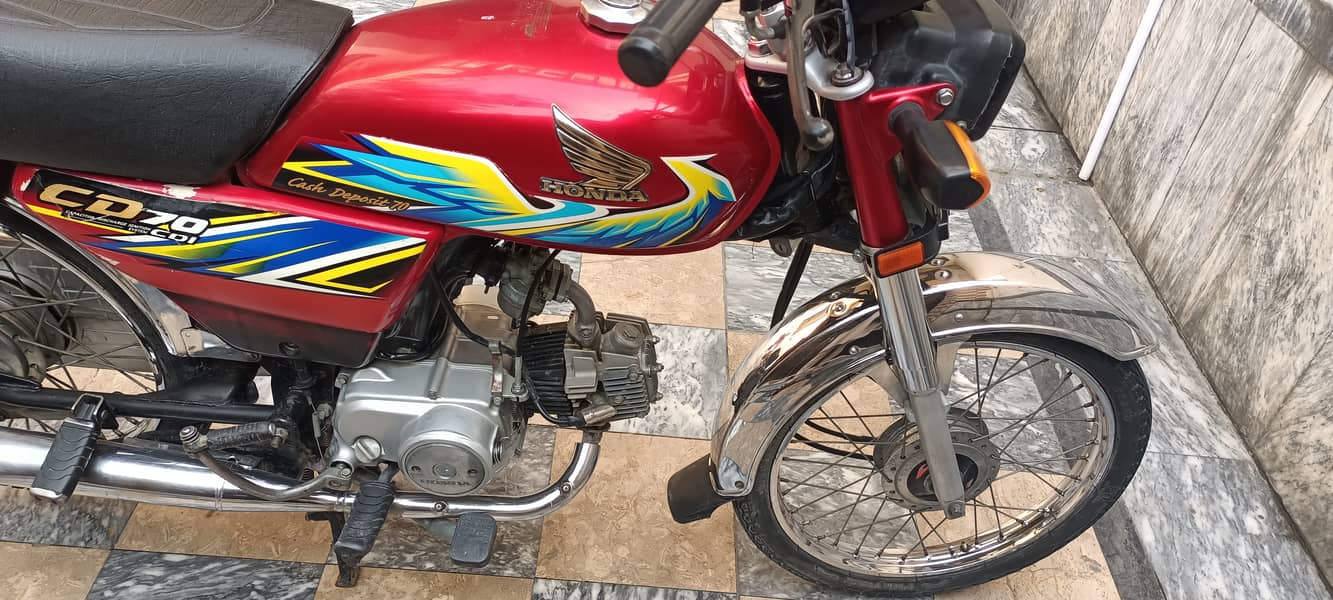 I am selling Honda CD 70 2021 model lush condition 7