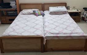 2 high quality wooden beds with one bed side