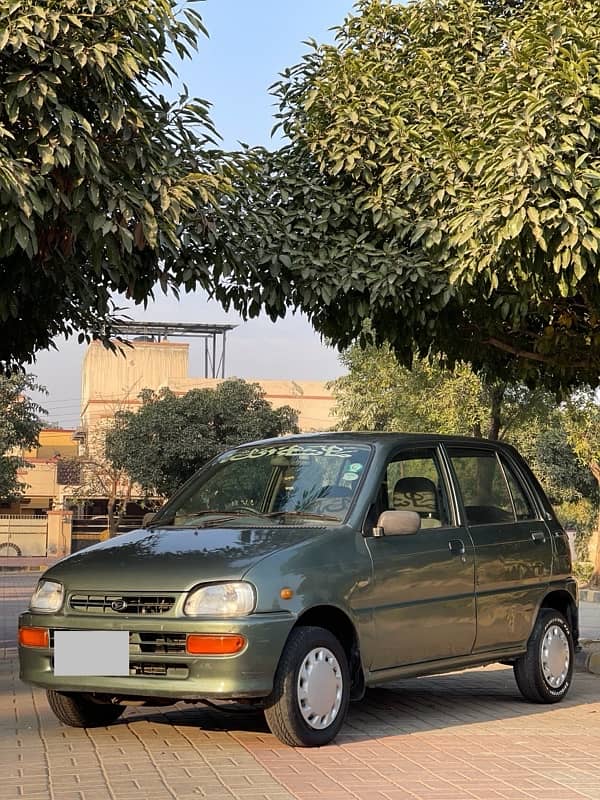 DAIHATSU CUORE 2011 MODEL KARACHI REG GOOD CAR 13