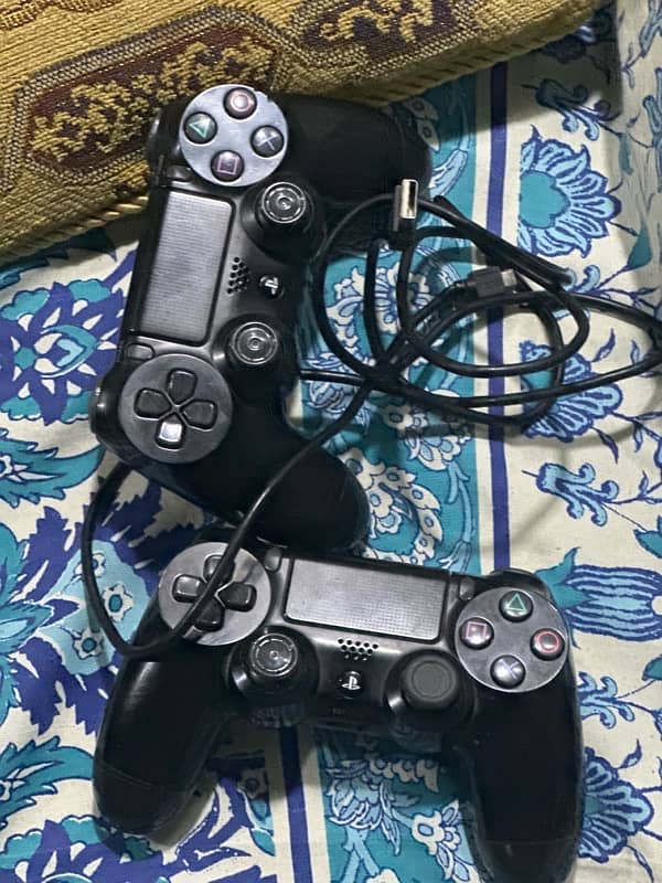 ps4 slim 1tb for sale with 2 controllers 1