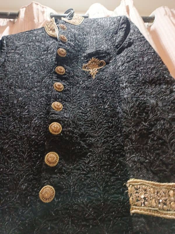 Grooms black and golden sherwani 7