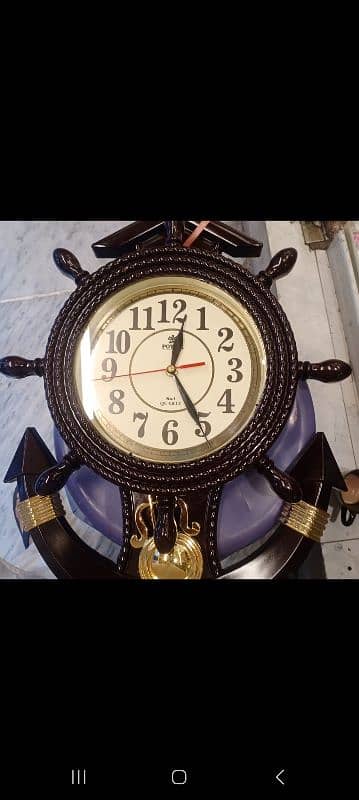 Pendulum wall clock 0